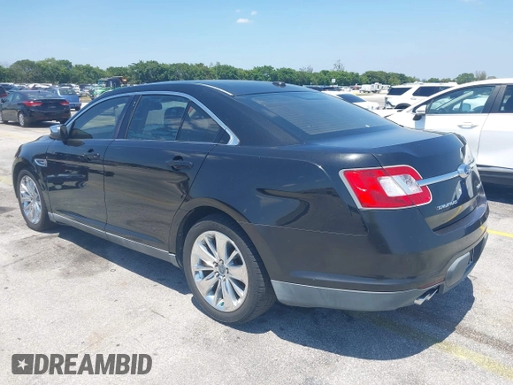 2010 Ford Taurus Limited with VIN 1FAHP2FW4AG151640, listed as a IAAI auction lot 42049305 with 135,769 mi miles. Bid and sale history available at carsss.com. Image 3.