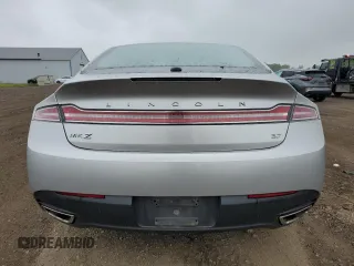 2014 Lincoln MKZ z VIN 3LN6L2GK8ER805655, wystawiony jako Copart lot #58504055 z przebiegiem 119 317 mil mil oraz Szkoda całkowita • Salvage title. Historia ofert i sprzedaży dostępna na DreamBid. Obrazek 6.