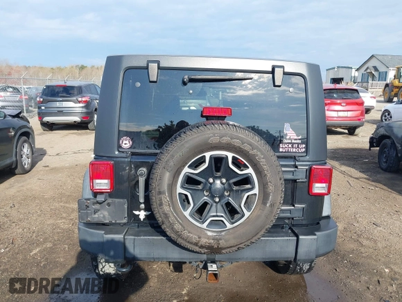 2013 Jeep Wrangler Unlimited Freedom z VIN 1C4BJWDG8DL648870, wystawiony jako IAAI lot #41909372 z przebiegiem 184 203 mil mil oraz . Historia ofert i sprzedaży dostępna na DreamBid. Obrazek 16.
