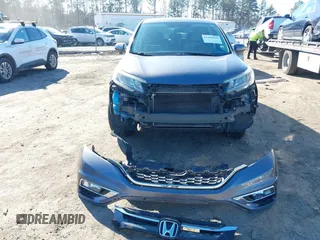 2016 Honda CR-V EX with VIN 5J6RM4H58GL095297, listed as a IAAI auction lot 41386994 with 154,595 mi miles and . Bid and sale history available at DreamBid. Image 6.