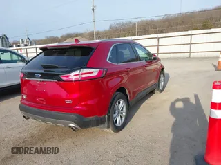 2020 Ford Edge SEL z VIN 2FMPK4J93LBA24658, wystawiony jako IAAI lot #41930062 z przebiegiem 79 235 mil mil oraz . Historia ofert i sprzedaży dostępna na DreamBid. Obrazek 4.