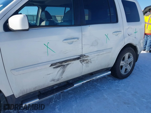 2013 Honda Pilot EX-L with VIN 5FNYF4H79DB086426, listed as a IAAI auction lot 41572456 with 190,745 mi miles and . Bid and sale history available at DreamBid. Image 6.