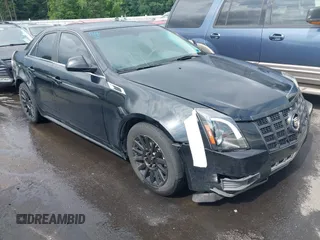 2013 Cadillac CTS Luxury z VIN 1G6DG5E52D0104450, wystawiony jako IAAI lot #42467248 z przebiegiem 144 139 mil mil oraz . Historia ofert i sprzedaży dostępna na DreamBid. Obrazek 1.