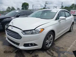 2016 Ford Fusion Titanium Hybrid with VIN 3FA6P0RU3GR190355, listed as a IAAI auction lot 42384309 with 157,172 mi miles and . Bid and sale history available at DreamBid. Image 17.