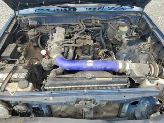 1994 Toyota Pickup z VIN 4TARN81A0RZ265181, wystawiony jako Copart lot #57574195 z przebiegiem 204 684 mil mil oraz Szkoda całkowita • Salvage title. Historia ofert i sprzedaży dostępna na DreamBid. Obrazek 11.