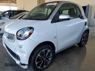 2016 Smart fortwo Passion with VIN WMEFJ5DA0GK051828, listed as a Copart auction lot 46659965 with 70,814 mi miles and Salvage Title. Bid and sale history available at DreamBid. Image 1.