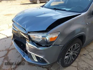 2018 Mitsubishi Outlander SE z VIN JA4AR3AW4JU006449, wystawiony jako IAAI lot #42159454 z przebiegiem 84 336 mil mil oraz . Historia ofert i sprzedaży dostępna na DreamBid. Obrazek 17.