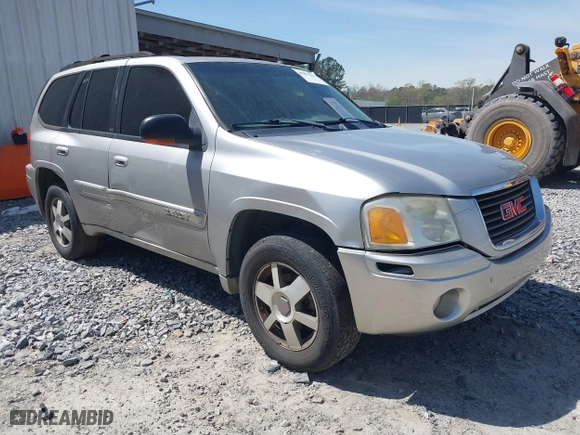 2005 GMC Envoy SLE with VIN 1GKDS13S652390259, listed as a IAAI auction lot 41825258 with 162,172 mi miles. Bid and sale history available at carsss.com. Image 1.