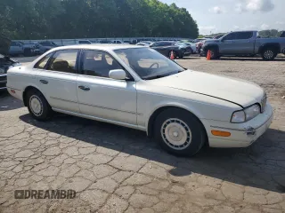 1994 Infiniti Q45 z VIN JNKNG01D3RM252218, wystawiony jako Copart lot #55309475 z przebiegiem 69 073 mil mil oraz Czysty tytuł • Clean title. Historia ofert i sprzedaży dostępna na DreamBid. Obrazek 4.