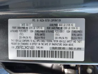 2017 Mazda CX-5 Touring with VIN JM3KFBCL3H0214881, listed as a IAAI auction lot 41694560 with 64,609 mi miles. Bid and sale history available at carsss.com. Image 9.