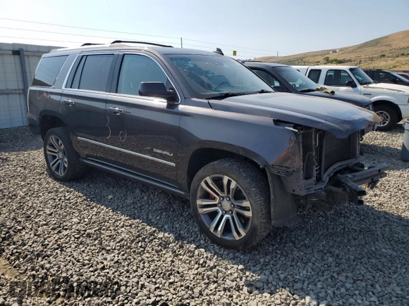 2018 GMC Yukon Denali with VIN 1GKS2CKJXJR217857, listed as a Copart auction lot 62943934 with 122,015 mi miles and Salvage Title. Bid and sale history available at carsss.com. Image 4.