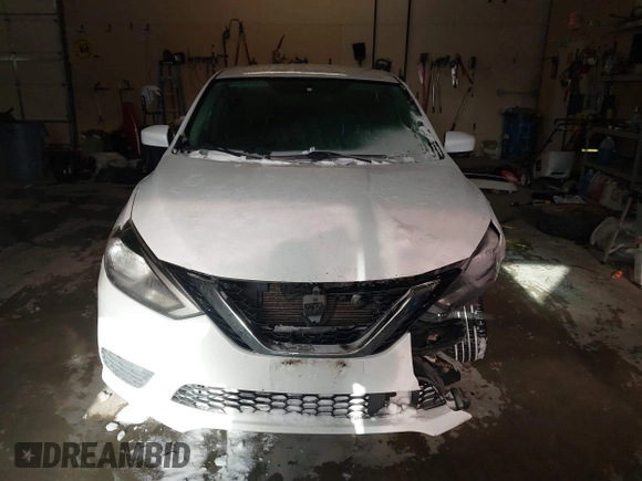 2019 Nissan Sentra S z VIN 3N1AB7AP9KY325065, wystawiony jako IAAI lot #41612204 z przebiegiem 141 818 mil mil oraz . Historia ofert i sprzedaży dostępna na DreamBid. Obrazek 12.