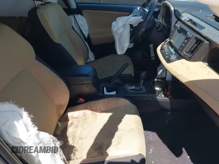 2018 Toyota RAV4 XLE with VIN 2T3WFREVXJW434957, listed as a IAAI auction lot 42002561 with 111,590 mi miles and . Bid and sale history available at carsss.com. Image 5.