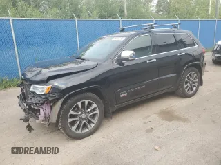 2018 Jeep Grand Cherokee High Altitude with VIN 1C4RJFCT6JC387960, listed as a Copart auction lot 65025735 with 140,883 mi miles and Salvage title. Bid and sale history available at DreamBid. Image 1.