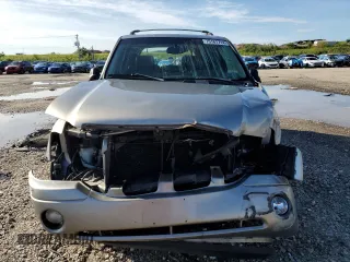 2002 GMC Envoy SLT with VIN 1GKDT13S122491329, listed as a Copart auction lot 75161714 with 149,659 mi miles and Salvage Title. Bid and sale history available at DreamBid. Image 5.