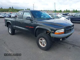 1999 Dodge Dakota SLT with VIN 1B7GG22YXXS229633, listed as a IAAI auction lot 42088939 with 148,049 mi miles and . Bid and sale history available at carsss.com. Image 1.