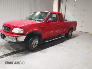 1997 Ford F-150 XL with VIN 1FTEX18L7VKD72386, listed as a IAAI auction lot 41667913 with 168,813 mi miles. Bid and sale history available at carsss.com. Image 2.
