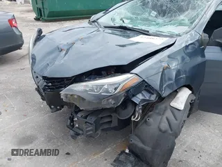 2018 Toyota Corolla L with VIN 5YFBURHE1JP814781, listed as a IAAI auction lot 42408378 with 115,543 mi miles and . Bid and sale history available at DreamBid. Image 18.