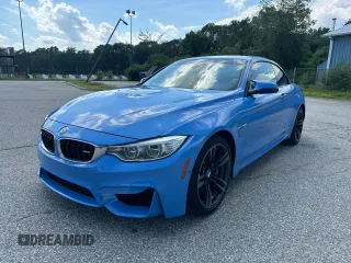 2015 BMW M4 with VIN WBS3U9C56FP967640, listed as a Copart auction lot 63641785 with 31,516 mi miles and Salvage title. Bid and sale history available at DreamBid. Image 2.