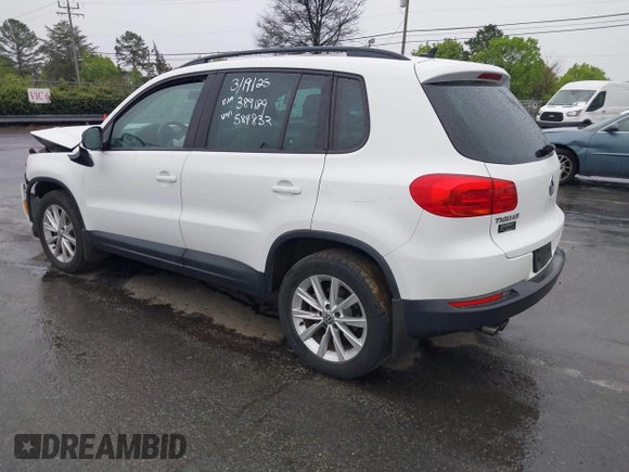 2015 Volkswagen Tiguan SE z VIN WVGBV7AX5FW584833, wystawiony jako IAAI lot #41855476 z przebiegiem 123 299 mil mil oraz . Historia ofert i sprzedaży dostępna na DreamBid. Obrazek 3.