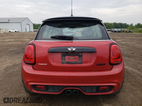 2016 MINI Hardtop S with VIN WMWXP7C57G3B33678, listed as a Copart auction lot 60609135 with 84,506 mi miles and Salvage title. Bid and sale history available at DreamBid. Image 6.