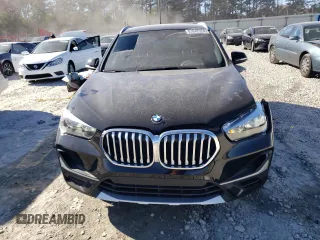 2022 BMW X1 sDrive28i with VIN WBXJG7C03N5V16273, listed as a Copart auction lot 83842324 with 19,303 mi miles and Salvage Title. Bid and sale history available at carsss.com. Image 5.