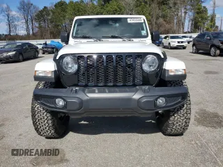 2023 Jeep Gladiator Sport S with VIN 1C6HJTAG4PL556387, listed as a Copart auction lot 47453305 with 35,611 mi miles and Salvage title. Bid and sale history available at DreamBid. Image 5.