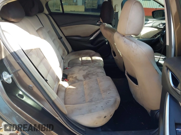2016 Mazda 6 i Sport with VIN JM1GJ1U59G1402840, listed as a IAAI auction lot 41920724 with 147,527 mi miles and . Bid and sale history available at DreamBid. Image 8.