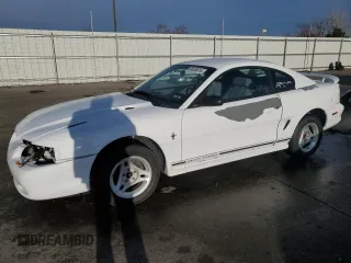 1997 Ford Mustang with VIN 1FALP4045VF120213, listed as a Copart auction lot 85335614 with 71,225 mi miles and Salvage Title. Bid and sale history available at carsss.com. Image 1.
