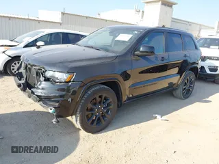 2022 Jeep Grand Cherokee WK Laredo X with VIN 1C4RJEAG0NC155473, listed as a IAAI auction lot 41533702 with 58,516 mi miles. Bid and sale history available at carsss.com. Image 2.