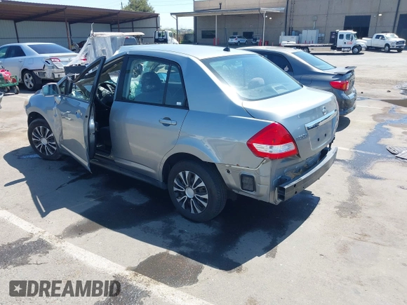 2009 Nissan Versa 1.8 S with VIN 3N1BC11E09L449780, listed as a IAAI auction lot 42034977 with 180,680 mi miles. Bid and sale history available at carsss.com. Image 3.
