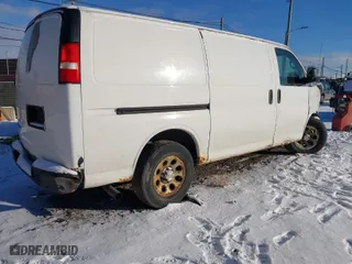 2009 Chevrolet Express Cargo Van with VIN 1GCFG15X691128588, listed as a IAAI auction lot 41078318 with 204,521 mi miles. Bid and sale history available at carsss.com. Image 4.