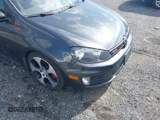 2011 Volkswagen GTI w/Sunroof & Navi PZEV z VIN WVWGD7AJ7BW070534, wystawiony jako IAAI lot #42159521 z przebiegiem 138 279 mil mil oraz . Historia ofert i sprzedaży dostępna na DreamBid. Obrazek 6.