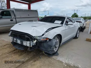 2018 Ford Mustang EcoBoost with VIN 1FA6P8TH4J5165145, listed as a IAAI auction lot 42414241 with 58,884 mi miles and . Bid and sale history available at DreamBid. Image 2.
