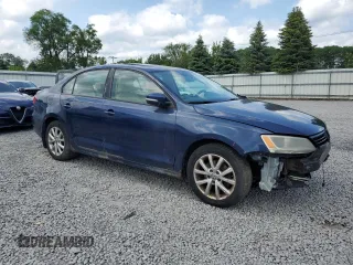 2012 Volkswagen Jetta SE with VIN 3VWDP7AJXCM392741, listed as a Copart auction lot 61436215 with 169,452 mi miles and Salvage title. Bid and sale history available at DreamBid. Image 4.