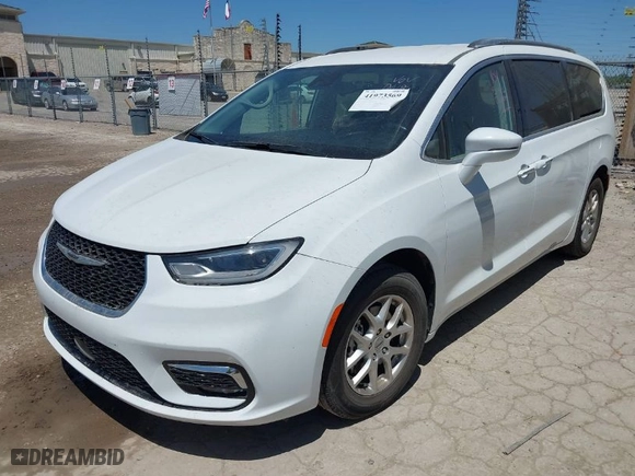 2021 Chrysler Pacifica Touring L with VIN 2C4RC1BG2MR598201, listed as a IAAI auction lot 41973569 with 55,861 mi miles. Bid and sale history available at carsss.com. Image 2.