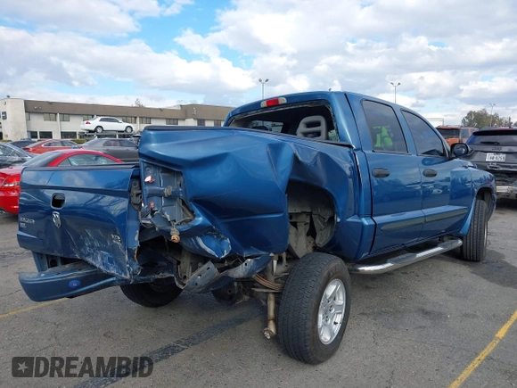 2005 Dodge Dakota SLT with VIN 1D7HE48N85S261745, listed as a IAAI auction lot 41401763 with 153,799 mi miles and . Bid and sale history available at DreamBid. Image 4.