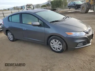 2012 Honda Insight z VIN JHMZE2H32CS000284, wystawiony jako Copart lot #50160335 z przebiegiem 64 074 mil mil oraz Szkoda całkowita • Salvage title. Historia ofert i sprzedaży dostępna na DreamBid. Obrazek 4.