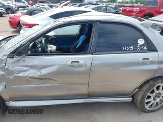2007 Subaru Impreza WRX STI z VIN JF1GD76677L526227, wystawiony jako IAAI lot #42034710 z przebiegiem 93 767 mil mil oraz . Historia ofert i sprzedaży dostępna na DreamBid. Obrazek 14.