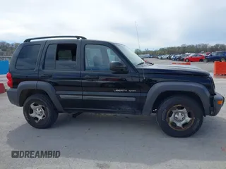 2003 Jeep Liberty Sport with VIN 1J4GL48KX3W530569, listed as a IAAI auction lot 41857397 with 172,303 mi miles. Bid and sale history available at carsss.com. Image 13.