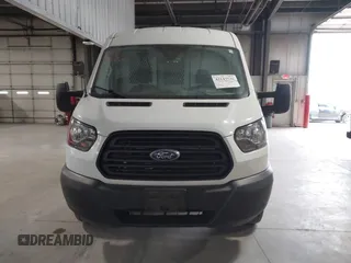 2019 Ford Transit with VIN 1FTBW2CM6KKB73059, listed as a IAAI auction lot 42143526 with 114,147 mi miles. Bid and sale history available at carsss.com. Image 12.