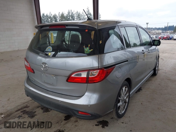 2014 Mazda 5 Touring with VIN JM1CW2CL6E0164146, listed as a IAAI auction lot 41458945 with 157,345 mi miles. Bid and sale history available at carsss.com. Image 4.