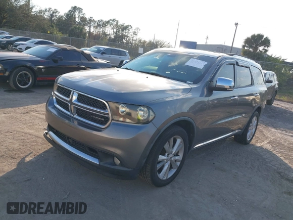2011 Dodge Durango Crew with VIN 1D4SD4GT0BC630240, listed as a IAAI auction lot 41494046 with 174,343 mi miles and . Bid and sale history available at DreamBid. Image 2.