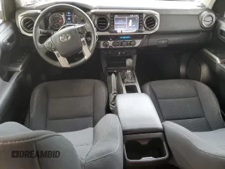 2021 Toyota Tacoma 4WD SR with VIN 5TFCZ5AN8MX282850, listed as a Copart auction lot 50272105 with 31,875 mi miles and Salvage Title. Bid and sale history available at carsss.com. Image 8.