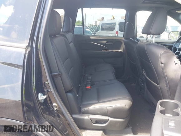 2023 Honda Passport Elite with VIN 5FNYF8H01PB030270, listed as a IAAI auction lot 42667744 with 7,931 mi miles and . Bid and sale history available at DreamBid. Image 8.