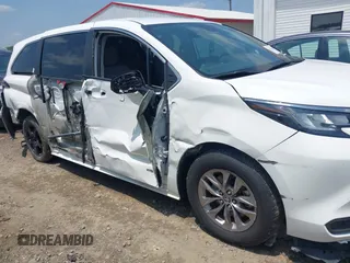 2021 Toyota Sienna LE with VIN 5TDKRKEC6MS029020, listed as a IAAI auction lot 42381285 with 103,260 mi miles and . Bid and sale history available at DreamBid. Image 6.