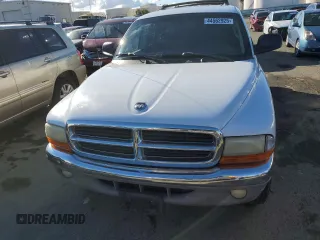 2001 Dodge Dakota z VIN 1B7HG2AX01S229161, wystawiony jako Copart lot #44562925 z przebiegiem 151 690 mil mil oraz Czysty tytuł • Clean title. Historia ofert i sprzedaży dostępna na DreamBid. Obrazek 5.