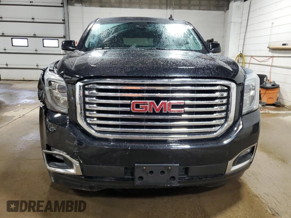 2016 GMC Yukon SLT with VIN 1GKS2BKC1GR440857, listed as a Copart auction lot 52683875 with 171,111 mi miles and Salvage Title. Bid and sale history available at carsss.com. Image 5.