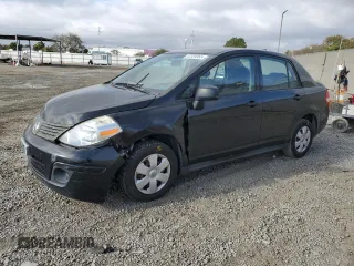 2010 Nissan Versa 1.6 with VIN 3N1CC1AP2AL411462, listed as a Copart auction lot 47059965 with 165,173 mi miles and Salvage title. Bid and sale history available at DreamBid. Image 1.