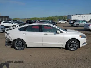 2017 Ford Fusion Hybrid Titanium с VIN 3FA6P0RU7HR148191, выставлен на аукционе IAAI как лот 42167708 с пробегом 72 708 миль миль и . История ставок и продаж доступна на DreamBid. Изображение 14.